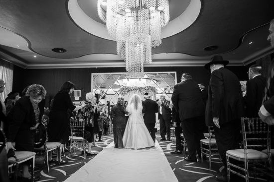 Black and white image of a Jewish wedding ceremony.
