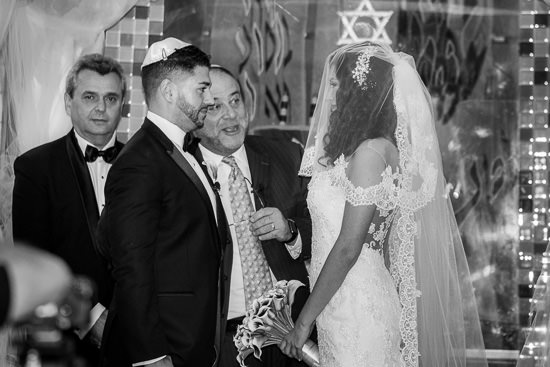 Black and white photo of a Jewish wedding ceremony.